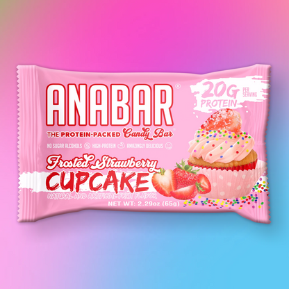 The Anabar's Frosted Strawberry Cupcake Protein Bar tempts with its "Frosted Strawberry Cupcake" flavor. The pink wrapper features a frosted cupcake with strawberries and emphasizes "20 Grams of Protein," enhanced by a calming pink-to-blue gradient.
.