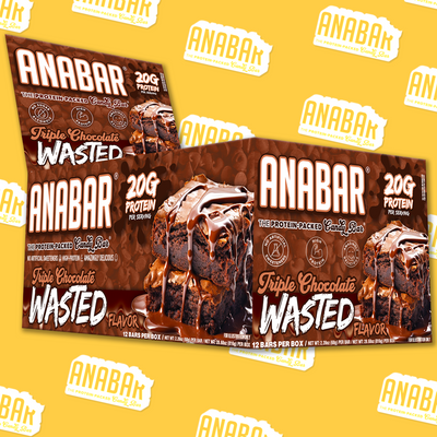 Boxes of The Anabar Triple Chocolate Wasted protein bars are displayed on a yellow background with repeating “ANABAR” logos. The packaging features rich chocolate imagery, highlights the indulgent milk chocolate coating, and prominently displays “20G Protein” in the top right corner—emphasizing these decadent chocolate protein bars.